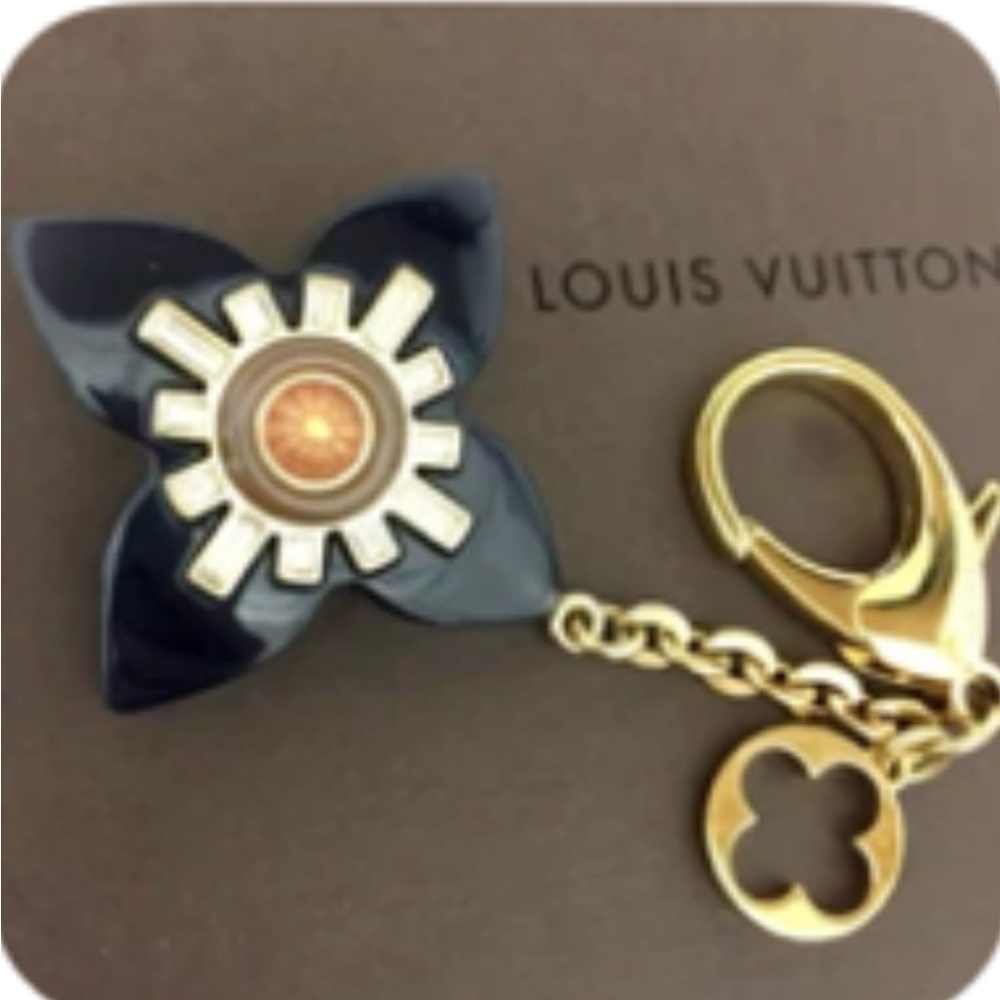Authentic Louis Vuitton Port Cles Fleur Etoile Black and Gold Flower Key Charm